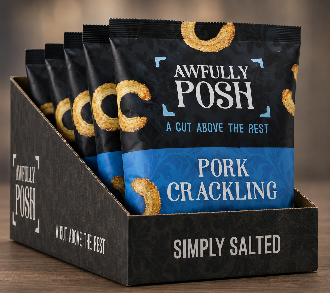 Awfully Posh Pork Crackling self-merchandising case - five sharing packs in a printed black retail tray with the AP brackets and 'A Cut Above The Rest' tagline